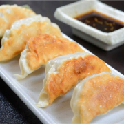 Pan Fried Gyoza (Prawn, Pork or Vegetarian) <br /> 三种馅料可选: 鲜虾馅, 猪肉馅或者素食馅